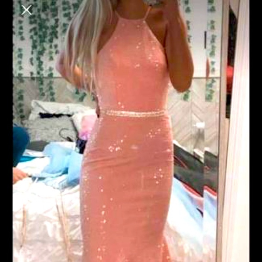 Beautiful pink dress. Worn for pageant and prom. Got compliments at both events.